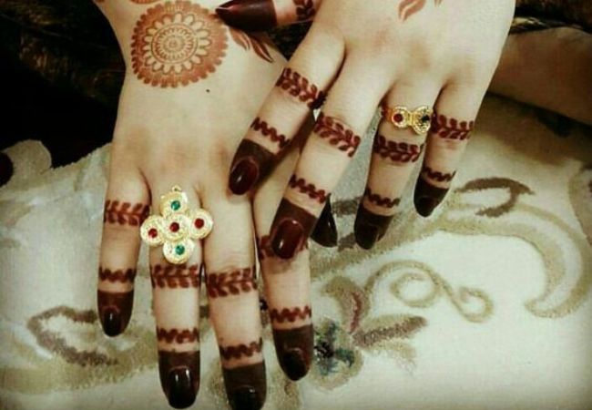 Mehndi design fingers
